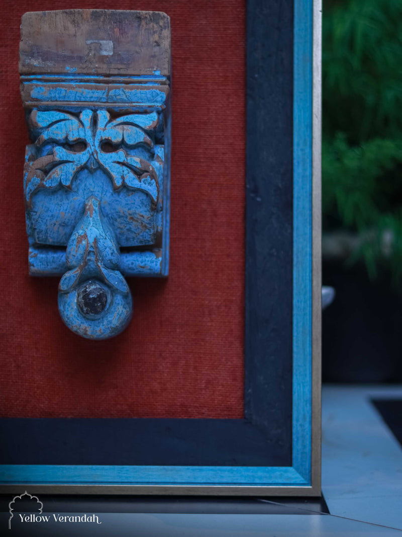 Blue Bracket on Wooden Wall Frame