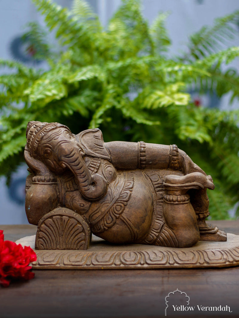 Antique Ganesha Sculpture in a relaxing pose