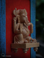 Wooden Ganesha on Blue Wall Frame